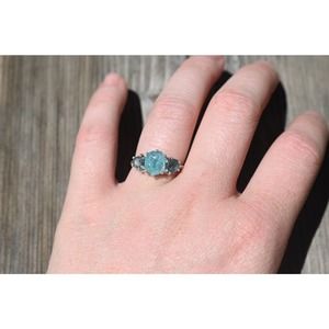 Aquamarine and blue Montana sapphire engagement ring